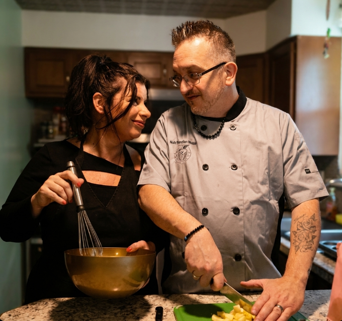 Jennifer and Matt, founders of Nutrifunction Meals, preparing food together
